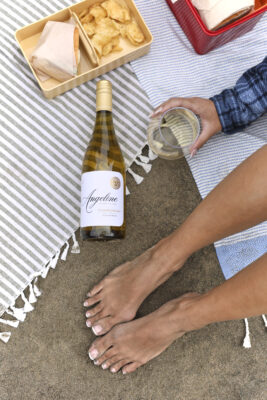 Angeline Chardonnay Lifestyle Image - Beach